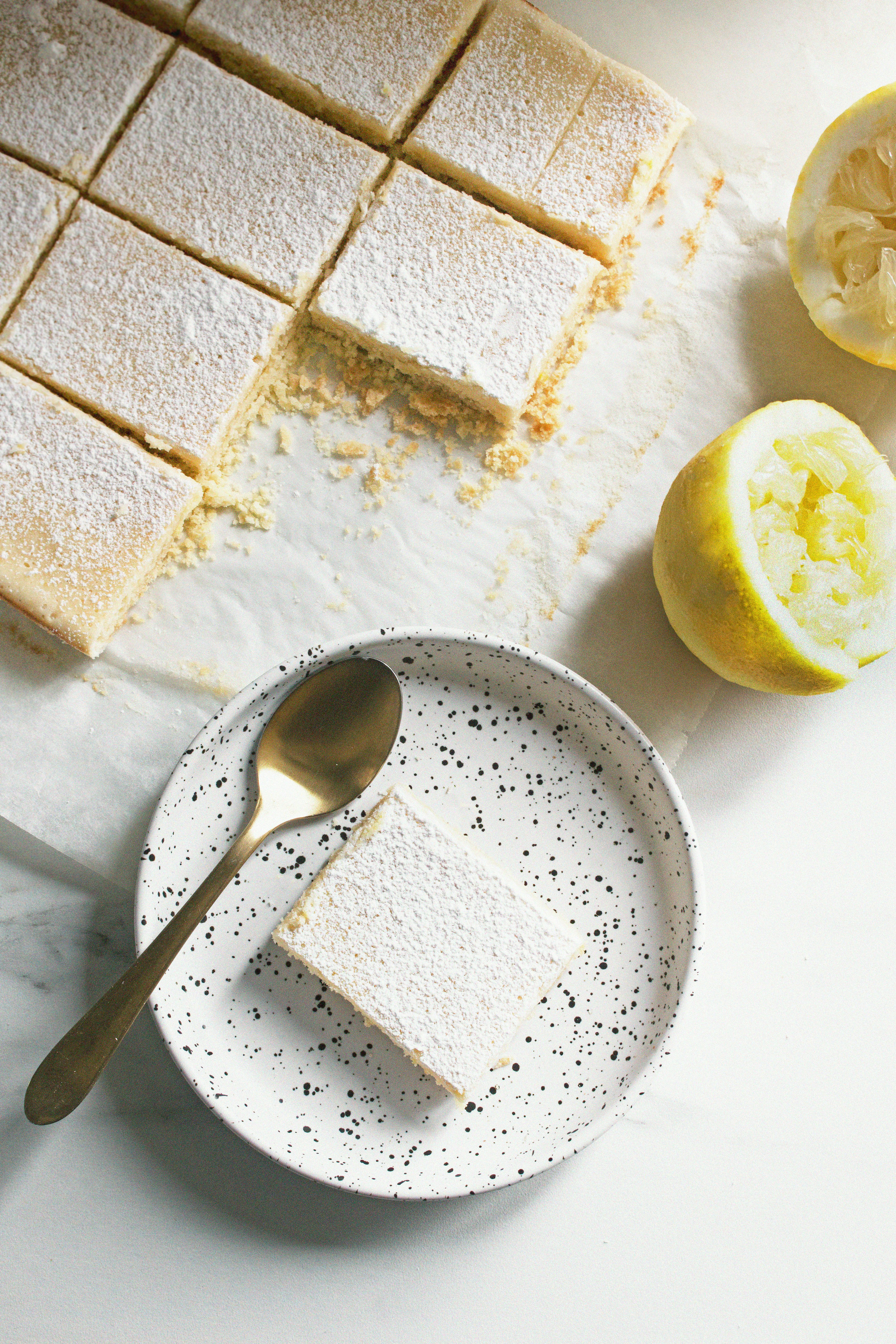 sliced lemon on white ceramic plate